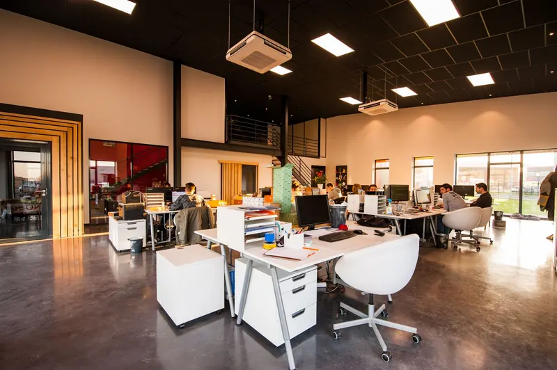 Open office with desks and monitors